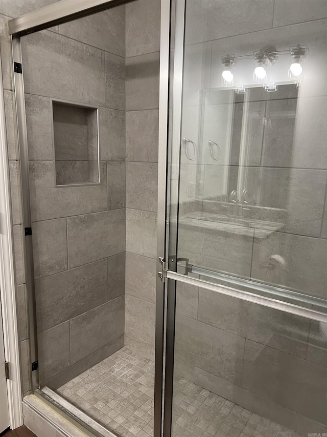 bathroom featuring walk in shower