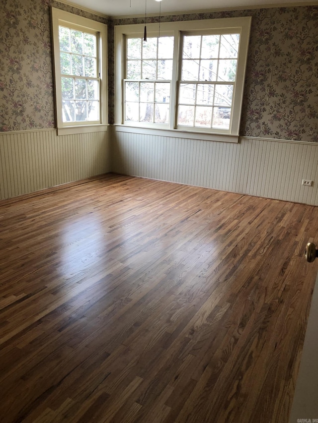 spare room with hardwood / wood-style flooring