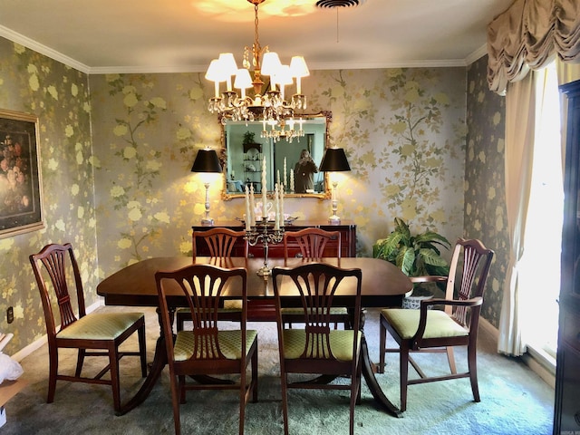 dining space featuring a chandelier, carpet, and ornamental molding