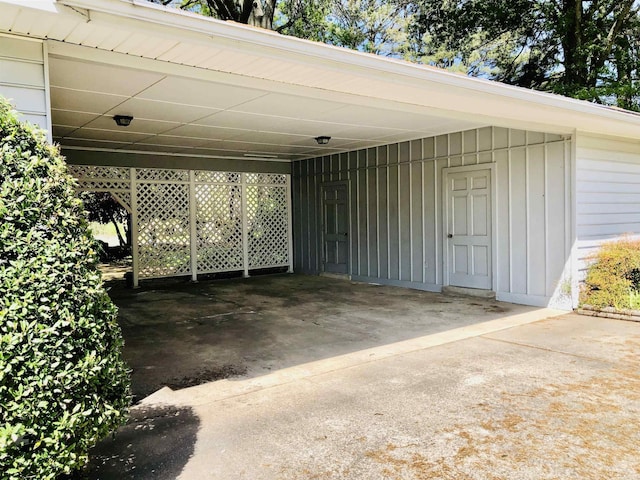 view of vehicle parking with a carport