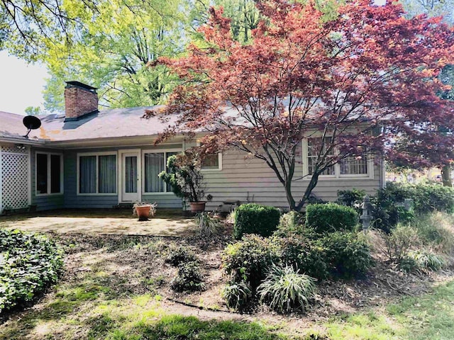 back of property with a patio area