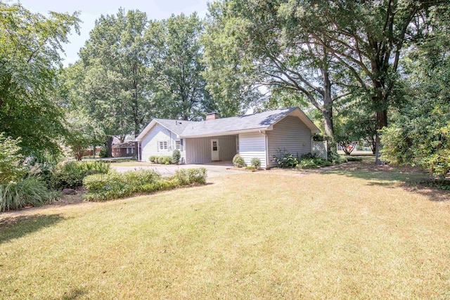 exterior space with a front lawn