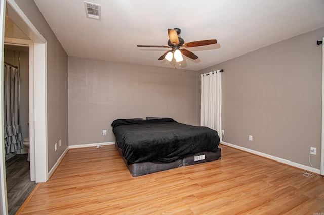 bedroom featuring light wood-type flooring and ceiling fan