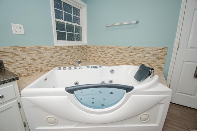 laundry area featuring hardwood / wood-style floors