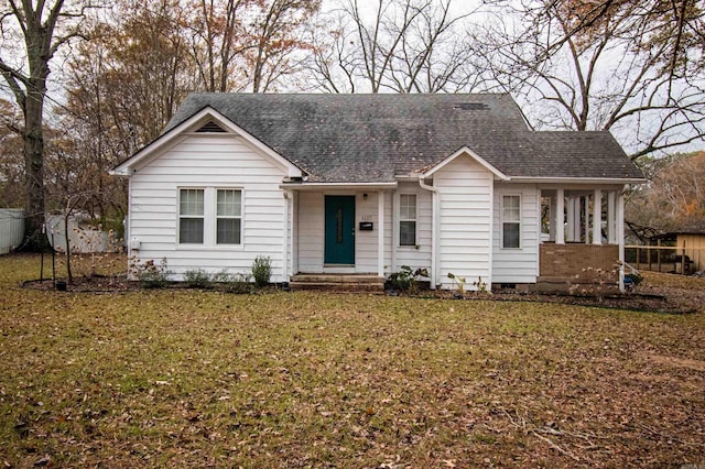 single story home featuring a front yard