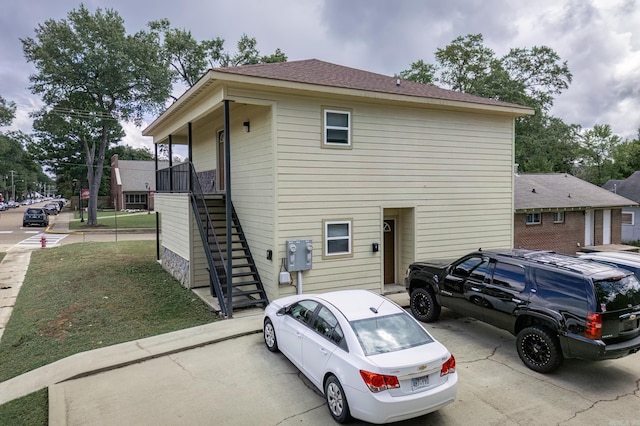 exterior space with a front yard