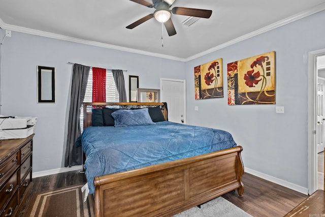 bedroom with ornamental molding, ceiling fan, and dark wood-type flooring