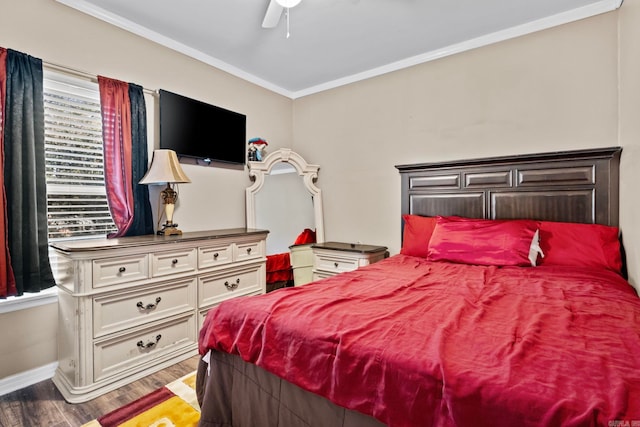 bedroom with wood-type flooring, ceiling fan, and ornamental molding