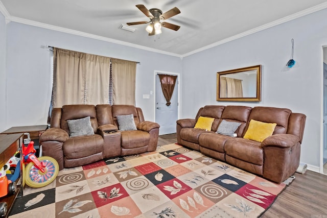 living room featuring crown molding, ceiling fan, and hardwood / wood-style flooring