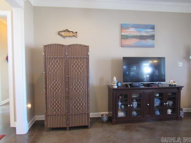 living room with ornamental molding