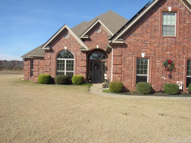 view of front of home with a front yard