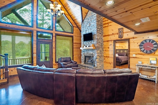 living room with high vaulted ceiling, wooden walls, and wood ceiling