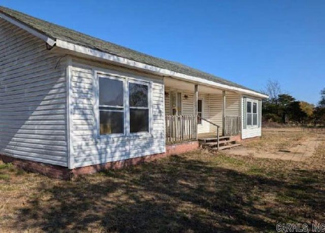 back of house with covered porch