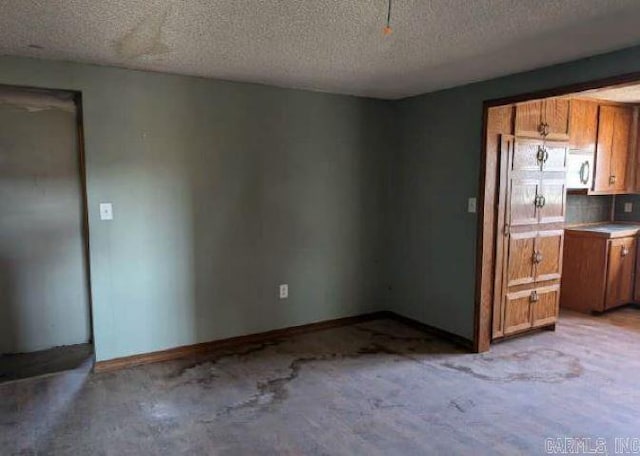 kitchen featuring a textured ceiling