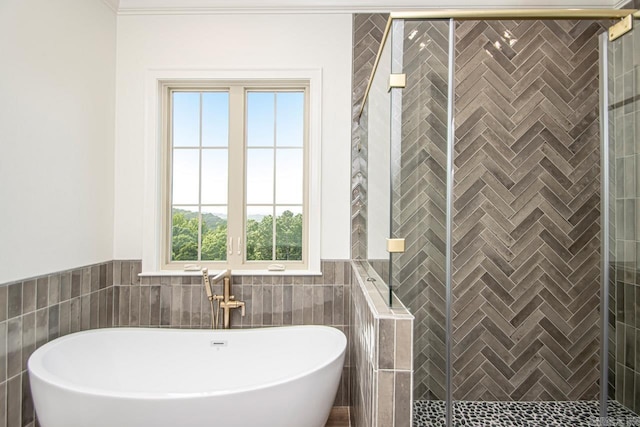 bathroom with plus walk in shower and tile walls