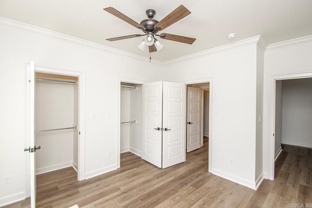 unfurnished bedroom featuring ceiling fan, light hardwood / wood-style floors, and ornamental molding