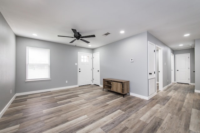 entryway with light hardwood / wood-style flooring and ceiling fan