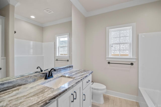 bathroom featuring vanity, toilet, and ornamental molding