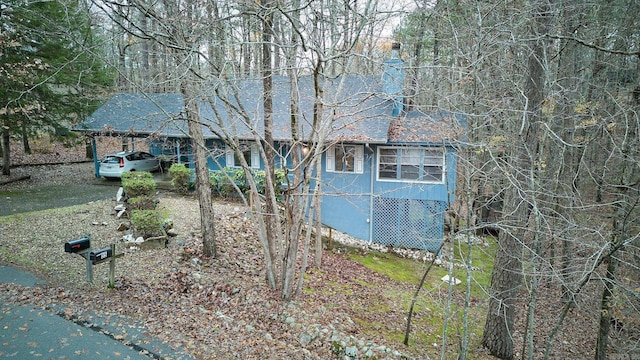 exterior space featuring a carport