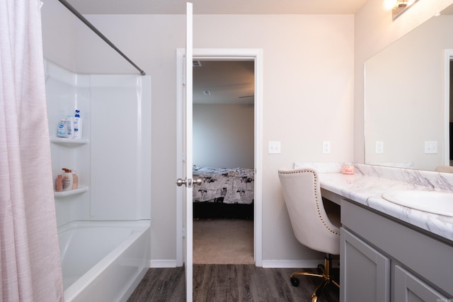 bathroom with vanity, shower / bath combo, and hardwood / wood-style flooring