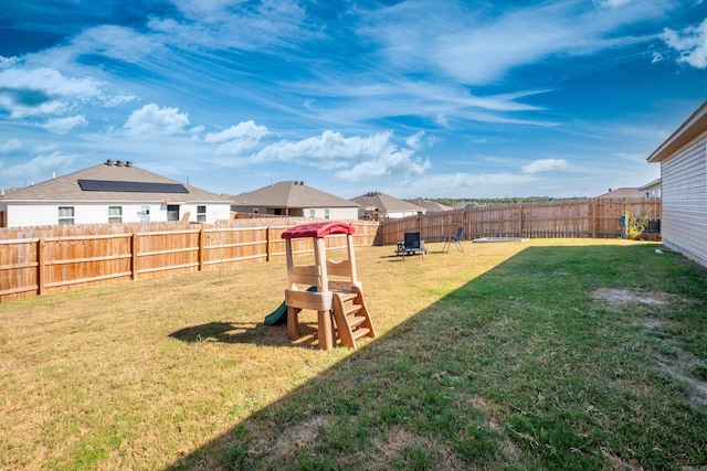 view of yard featuring a playground