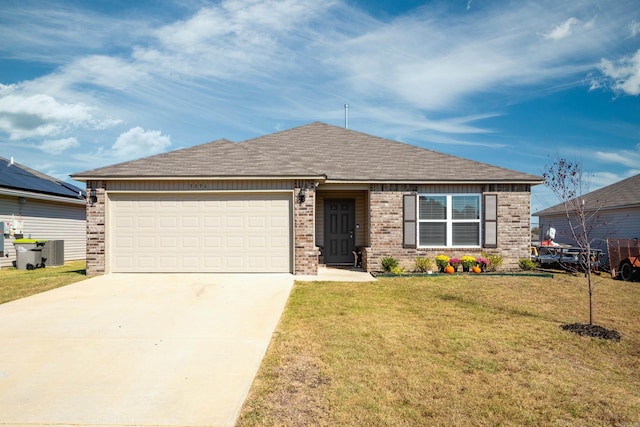 view of front of house featuring central AC unit, a garage, and a front lawn