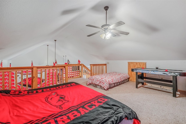 bedroom with carpet, vaulted ceiling, and ceiling fan