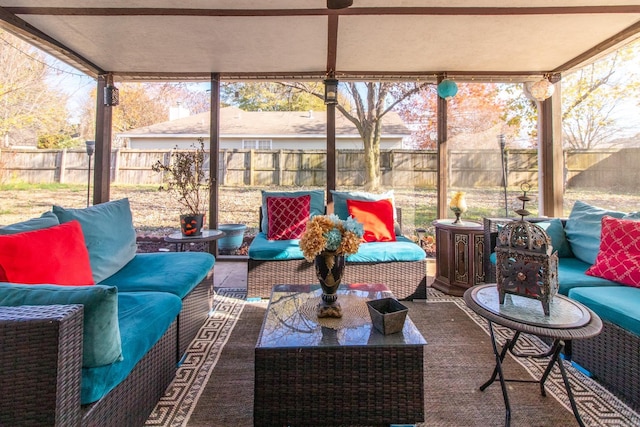 sunroom / solarium featuring a wealth of natural light