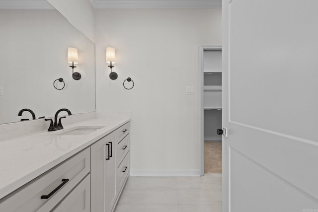 bathroom with vanity and crown molding