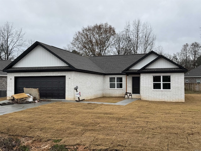 single story home with a garage, central air condition unit, and a front yard