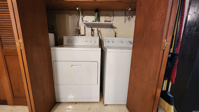 laundry room featuring washing machine and dryer