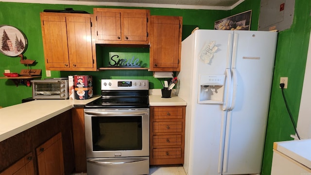 kitchen with white refrigerator with ice dispenser, stainless steel range with electric stovetop, and ornamental molding