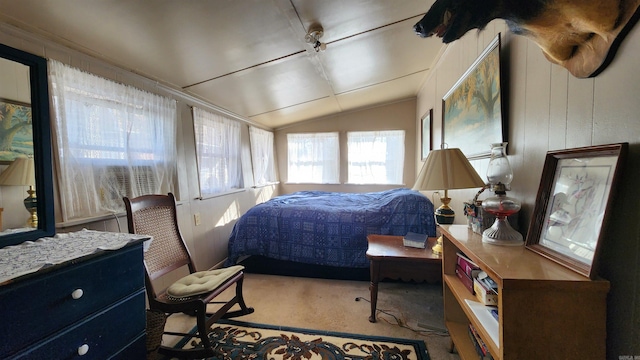 bedroom with carpet and vaulted ceiling