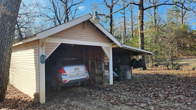 garage with a carport