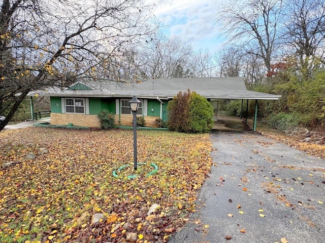 view of front of house featuring a carport