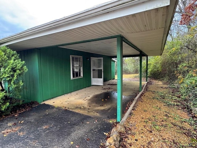 exterior space featuring a carport