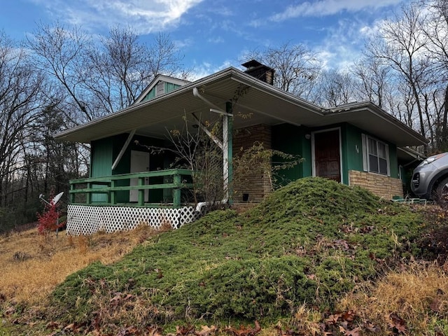 view of home's exterior with covered porch