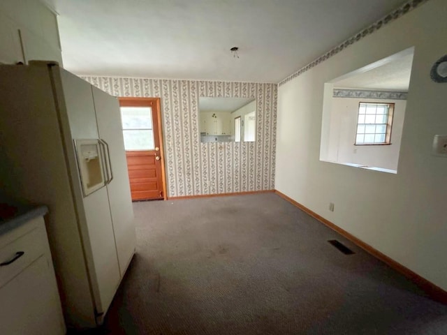 unfurnished room with carpet