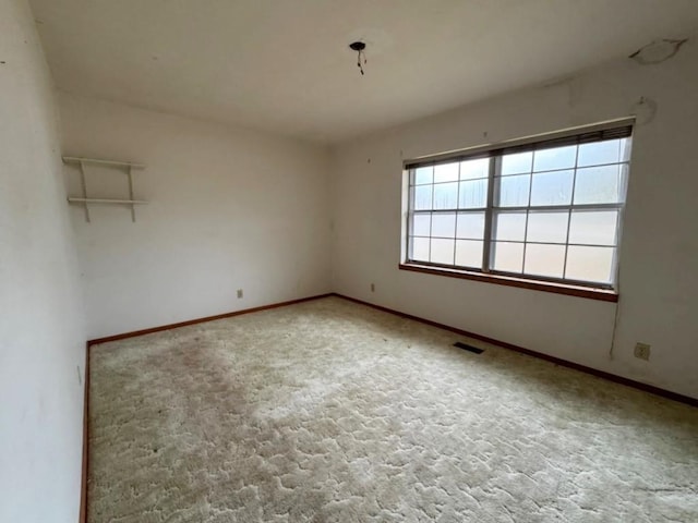 empty room with carpet flooring