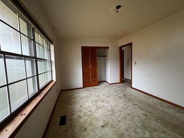 unfurnished bedroom featuring a closet