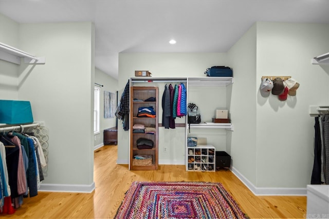 spacious closet featuring hardwood / wood-style floors