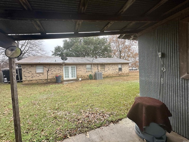 view of yard with central AC