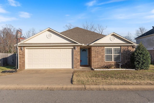 ranch-style house featuring a garage