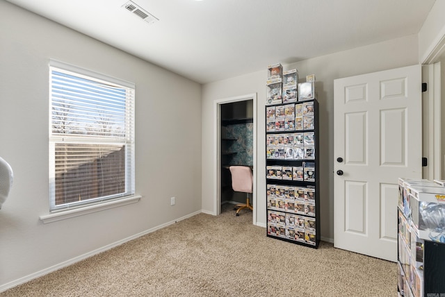 unfurnished bedroom featuring light carpet