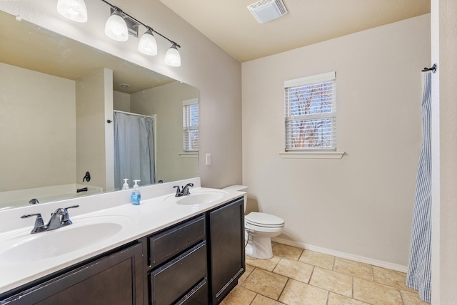 full bathroom featuring vanity, separate shower and tub, and toilet