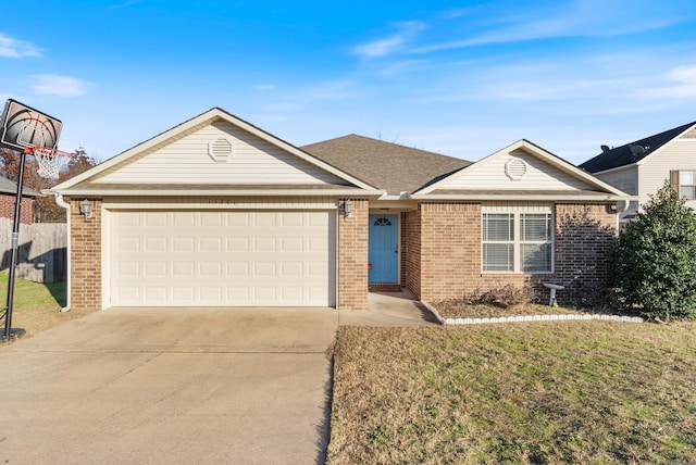 ranch-style home with a front yard and a garage