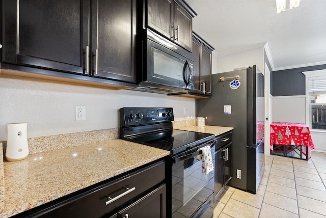 kitchen featuring light stone counters, ornamental molding, dark brown cabinets, black appliances, and light tile patterned flooring