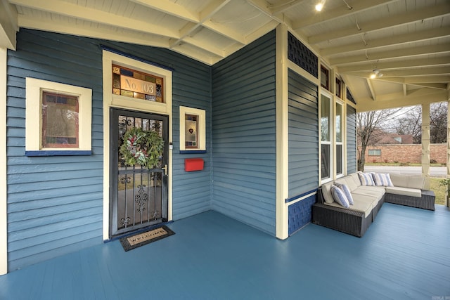 doorway to property featuring a porch