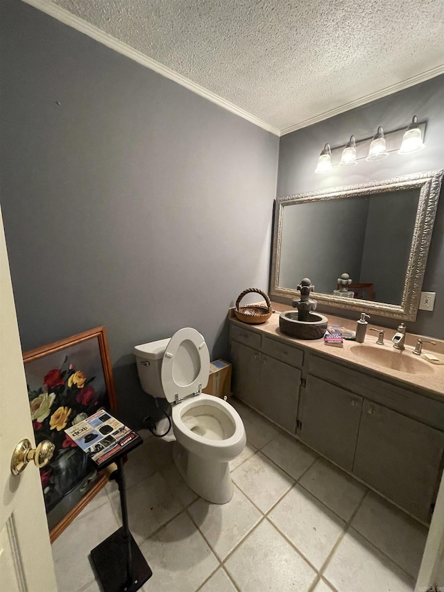 bathroom featuring tile patterned floors, crown molding, a textured ceiling, toilet, and vanity