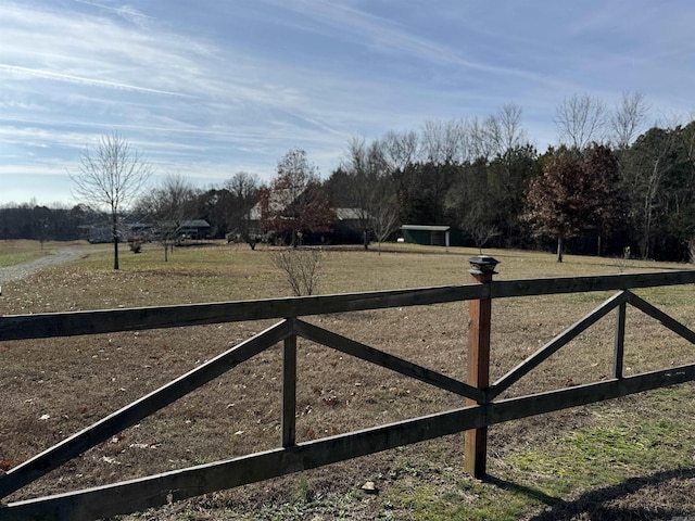 view of gate featuring a rural view